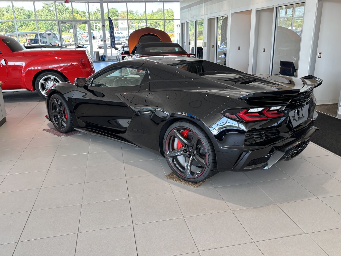 Black 2026 Chevrolet Corvette Z06 on the showroom floor at Crivelli Chevrolet Buick in Mount Pleasant, PA