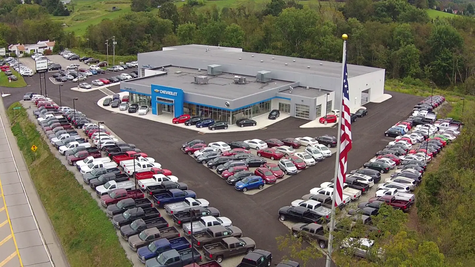 Aerial view of the Crivelli Chevrolet Buick dealership and full lot on Route 31 in Mount Pleasant, PA